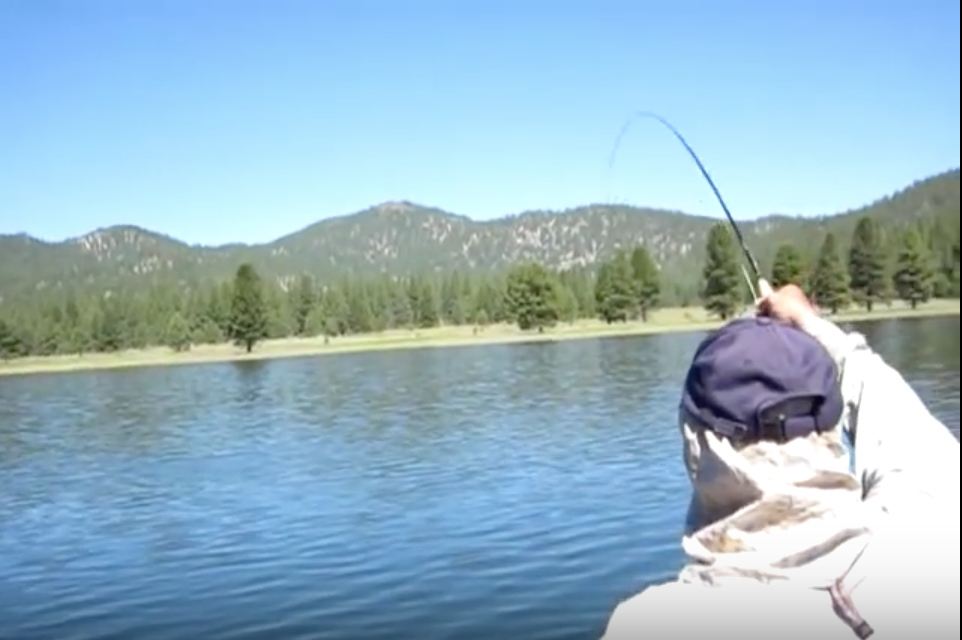 A first-person view of casting a fly rod from a boat on Round Valley Reservoir